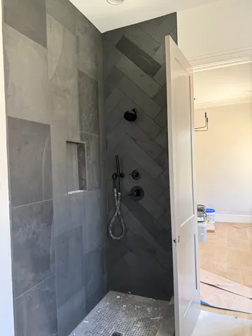 a bathroom with a sink and vanity
