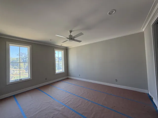 a view of living room with furniture and a flat screen tv