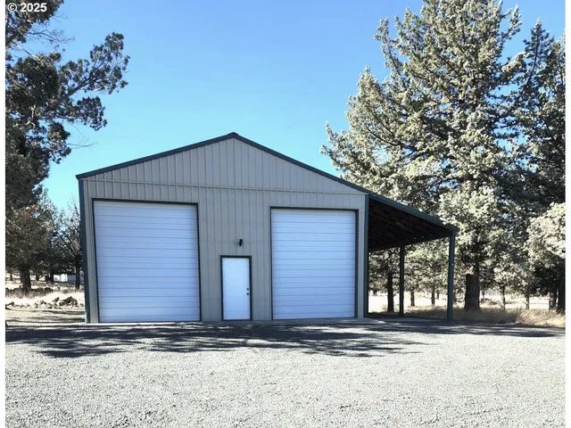 a view of a covered with snow on the road