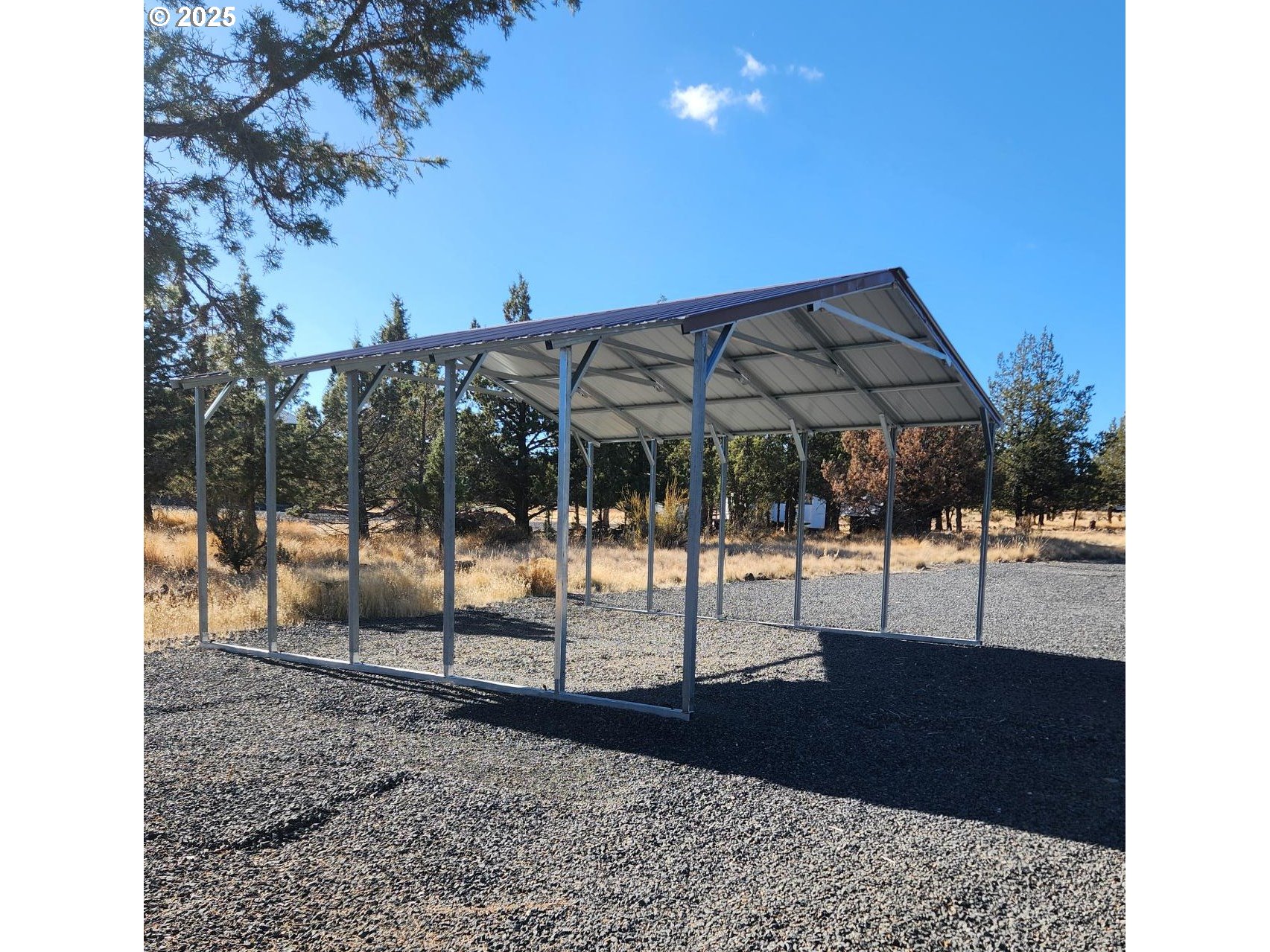5215 Southwest Upper Canyon Rim Drive Culver, OR 97734 - Photo 23 of 24 a view of a chairs and tables in the patio
