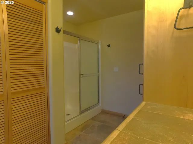 a view of staircase and a kitchen with furniture and stairs