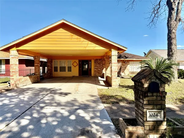 a view of a house with a patio