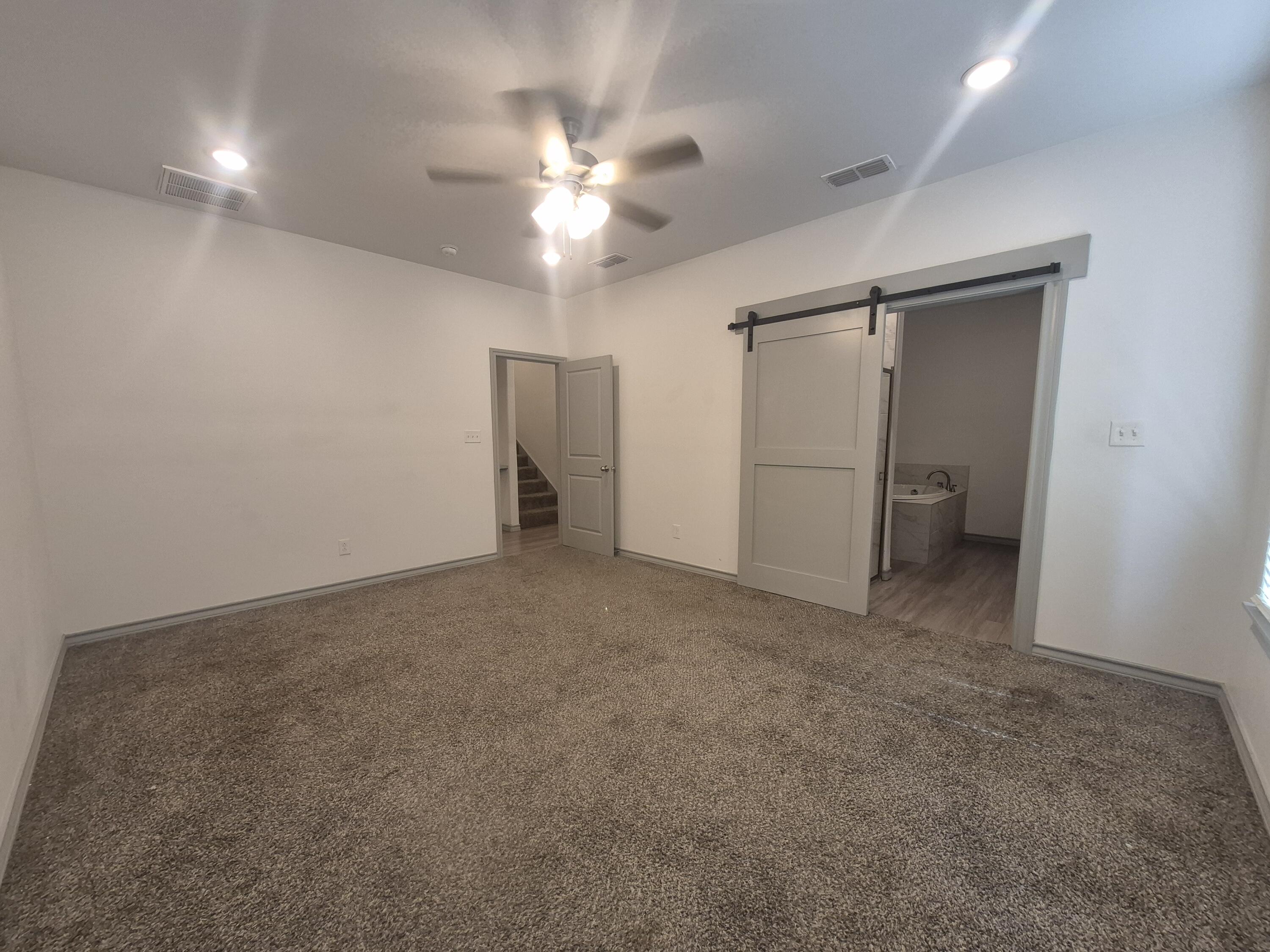 4718 125th Street Lubbock, TX 79424 - Photo 13 of 18 a view of an empty room