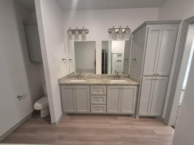 a view of an empty walk in closet