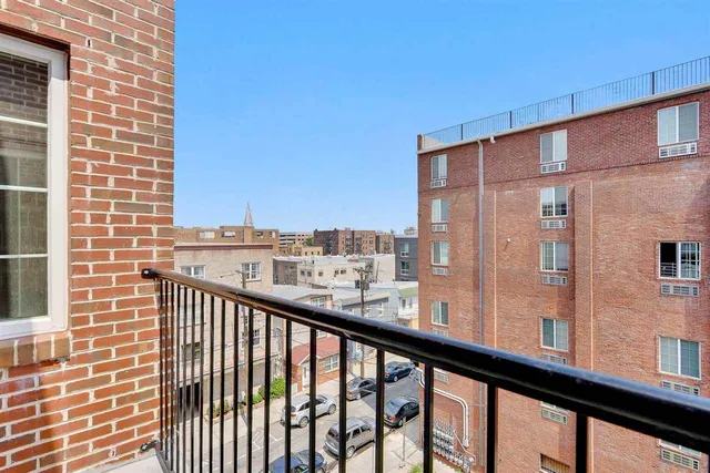 a view of city from a balcony