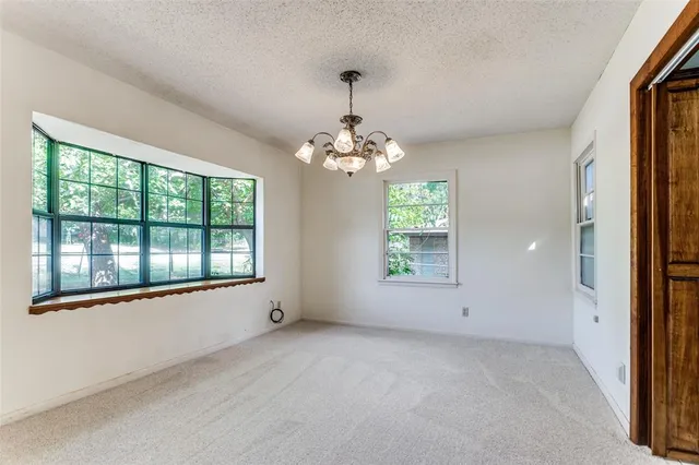 a view of empty room with a window