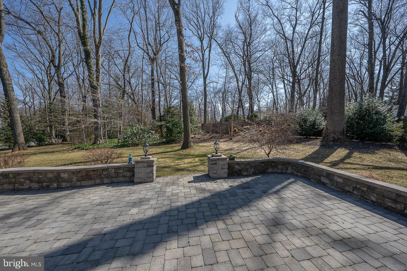 24 Northwoods Road Wayne, PA 19087 - Photo 49 of 56 Rear short walled patio with pavers