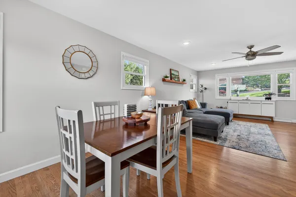 a kitchen with stainless steel appliances granite countertop a sink stove and microwave