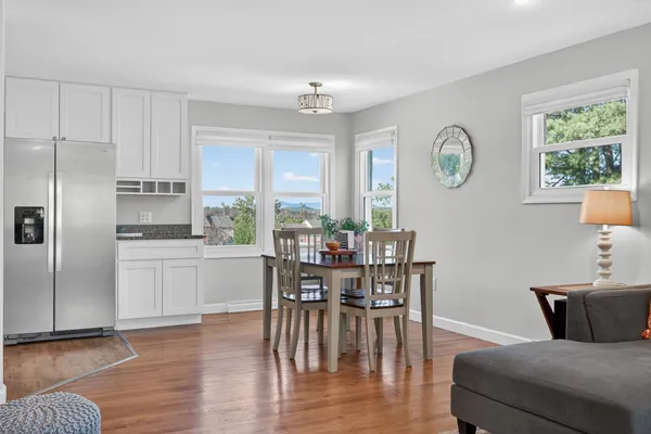 a kitchen with stainless steel appliances granite countertop a stove and a sink