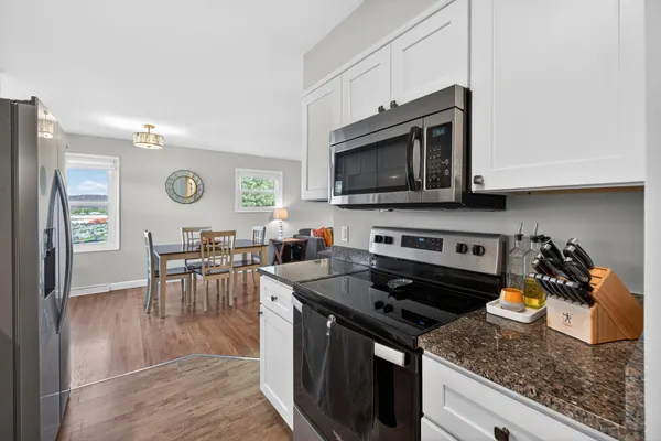 a bedroom with a bed and a view of bathroom