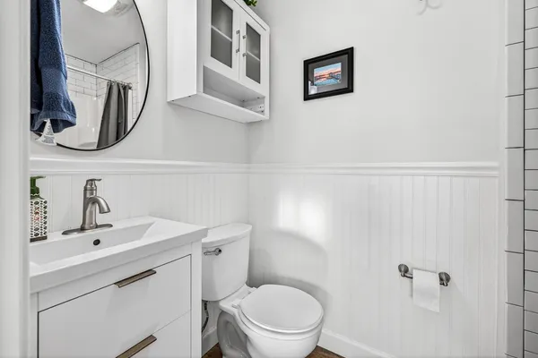 a living room with furniture and a rug