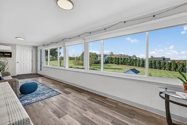 a front view of house with yard and green space