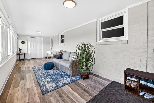a view of a backyard with plants and a patio