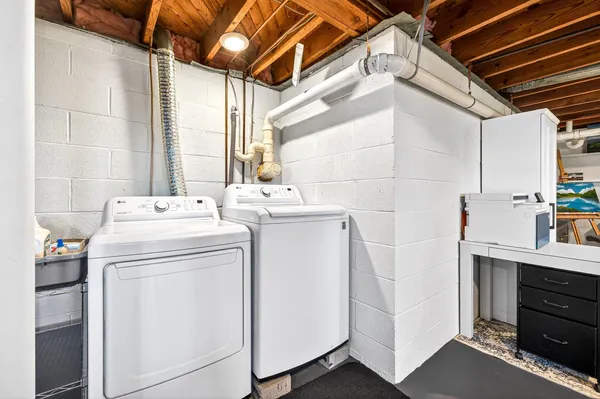 an aerial view of a houses with outdoor space