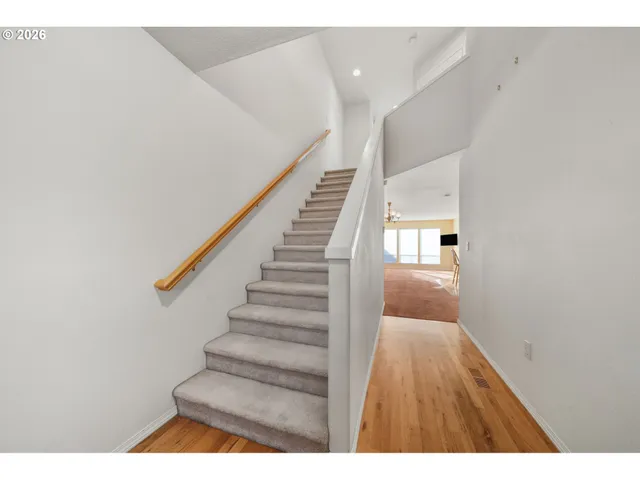 a view of entryway with wooden floor
