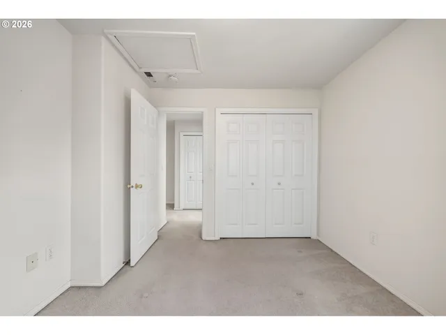 a view of an house with backyard and garden