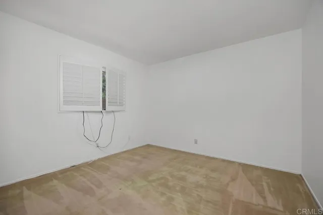 a view of a room with rack on the wall