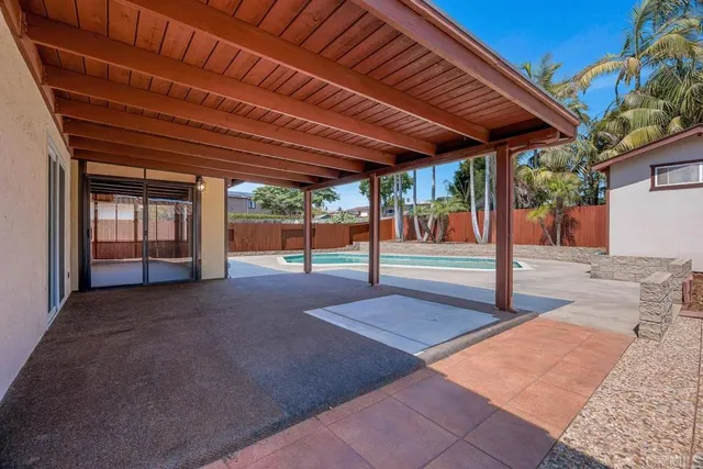 a view of a backyard of the house