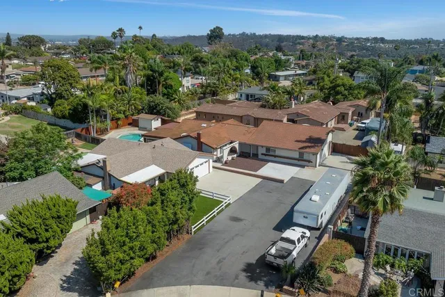 an aerial view of a city with lots of residential buildings