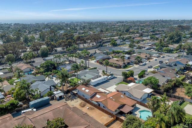 an aerial view of a city with lots of residential buildings