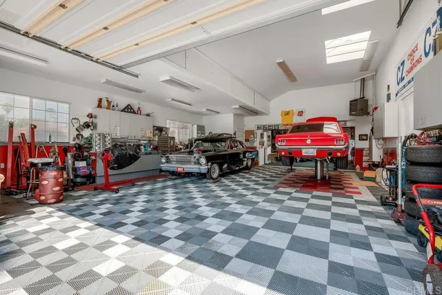 a living room with lots of furniture and a flat screen tv