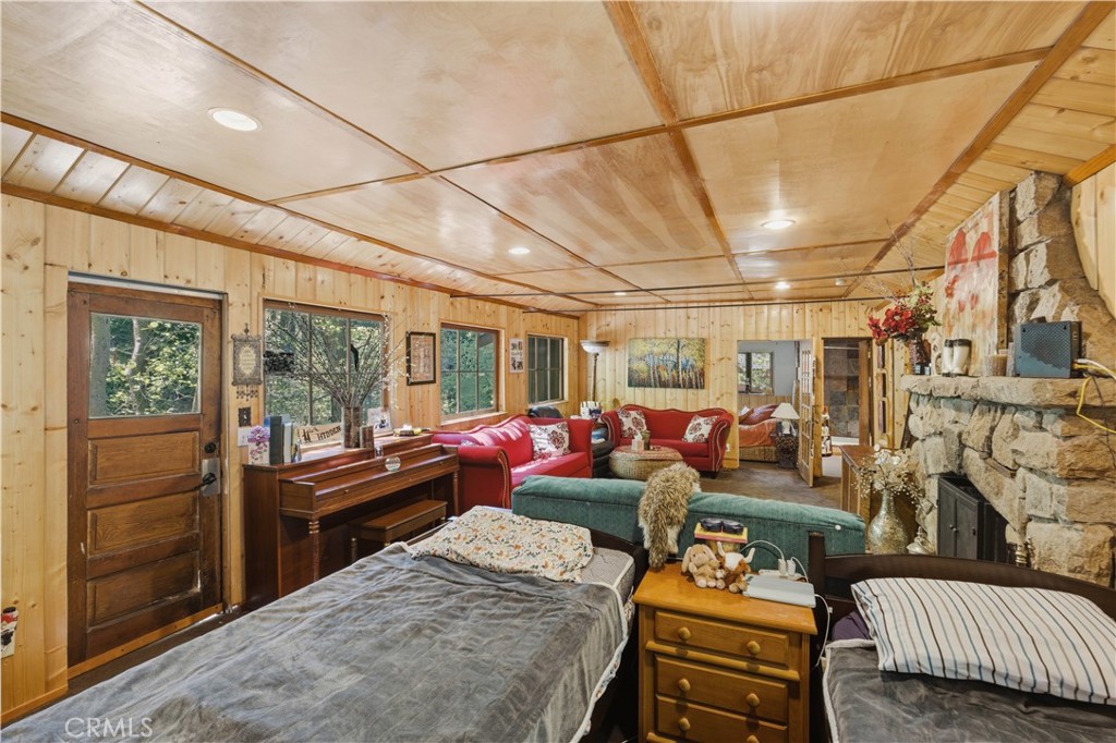 815 Cottage Grove Road Lake Arrowhead, CA 92352 - Photo 11 of 46 a living room with furniture a couch and large window