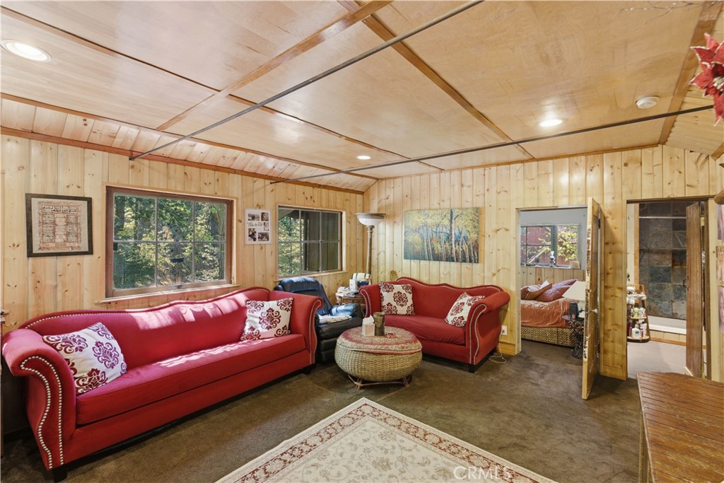 815 Cottage Grove Road Lake Arrowhead, CA 92352 - Photo 15 of 46 a living room with furniture and a large window