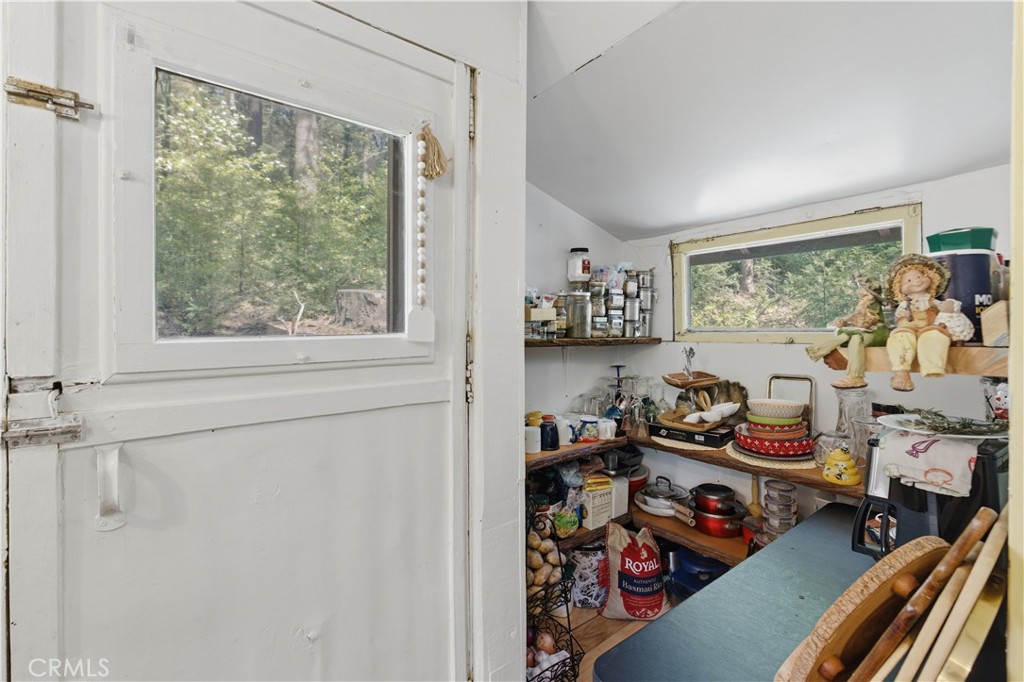 815 Cottage Grove Road Lake Arrowhead, CA 92352 - Photo 26 of 46 a room with furniture and a window