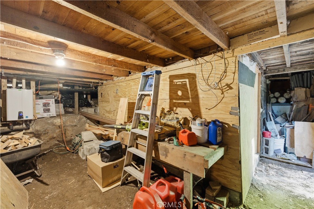 815 Cottage Grove Road Lake Arrowhead, CA 92352 - Photo 32 of 46 a view of a storage room with wooden floor