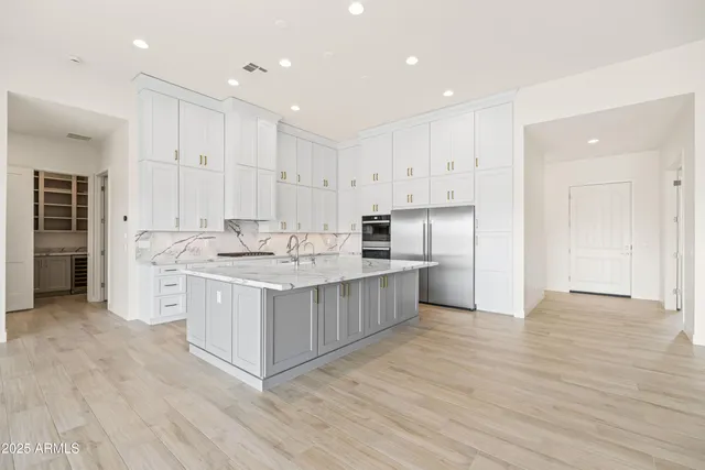 a view of kitchen and windows