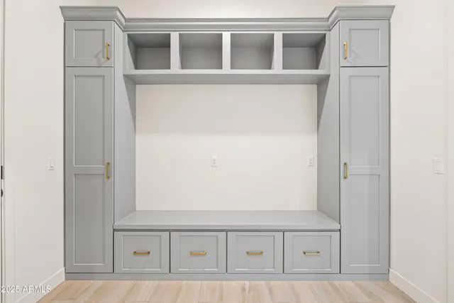 a bathroom with a shower and a toilet