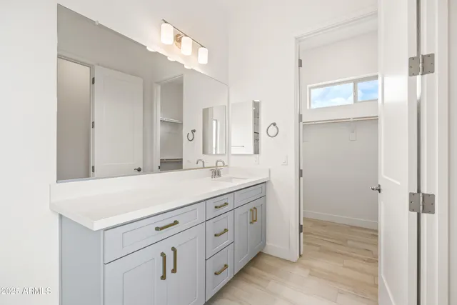 a view of a field with a mountain in the background