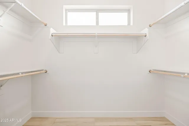 an aerial view of residential house and sandy dunes