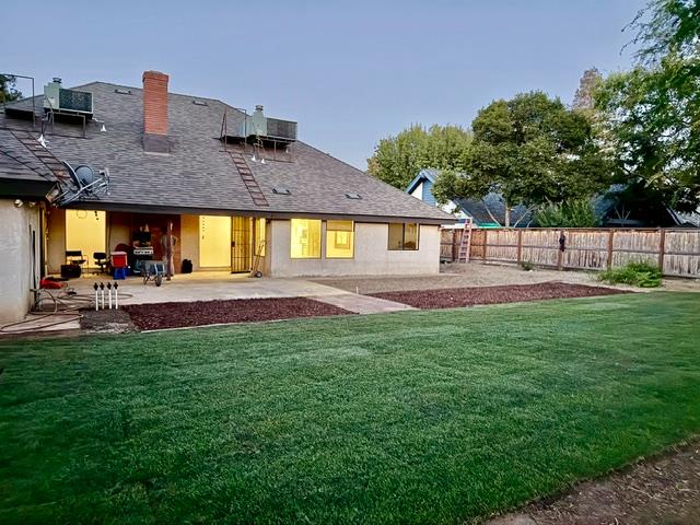8357 North First Street Fresno, CA 93720 - Photo 2 of 40 a house view with outdoor space and garden