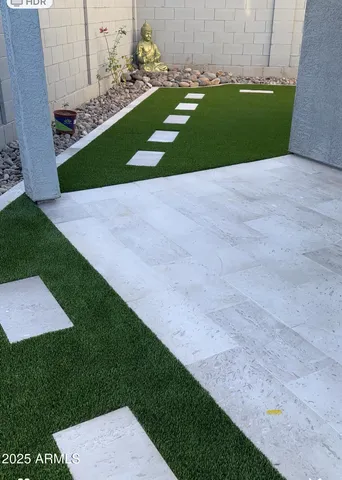 a view of a park with large trees