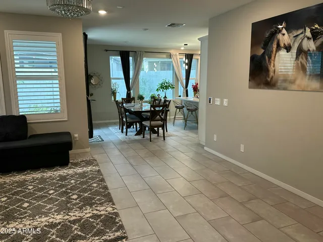 a view of a livingroom with furniture and window