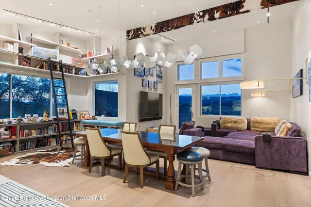 a bathroom with a sink mirror vanity and toilet