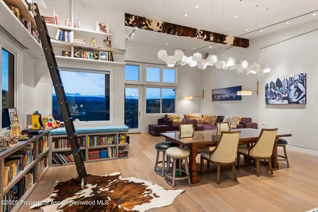 a kitchen with stainless steel appliances kitchen island granite countertop a sink and cabinets