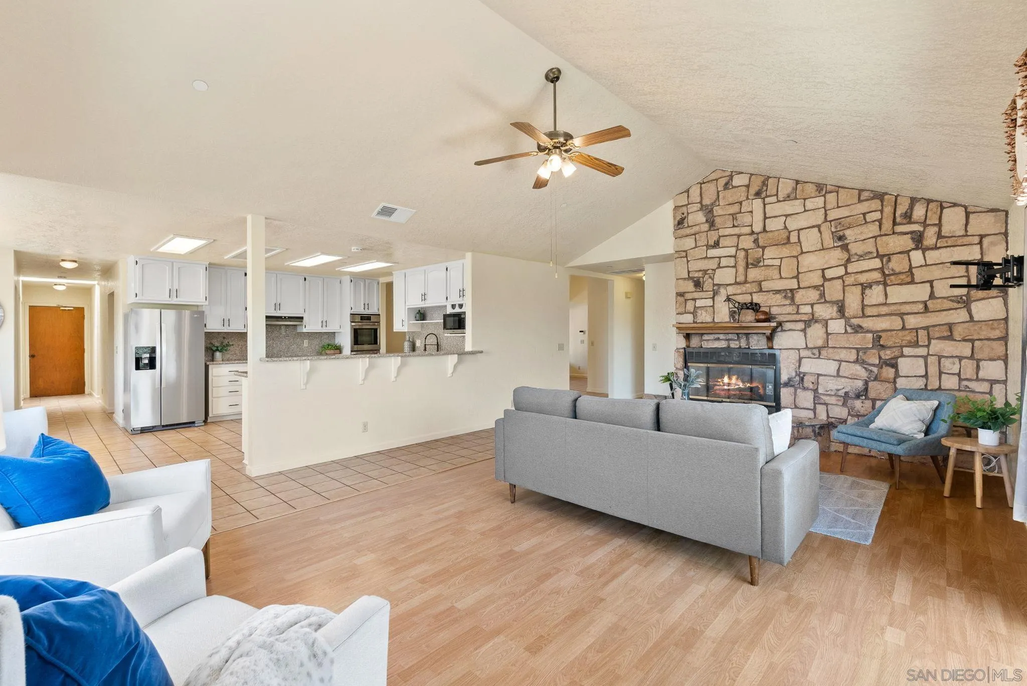 3290 Quail Way Jamul, CA 91935 - Photo 36 of 73 a living room with furniture and kitchen view