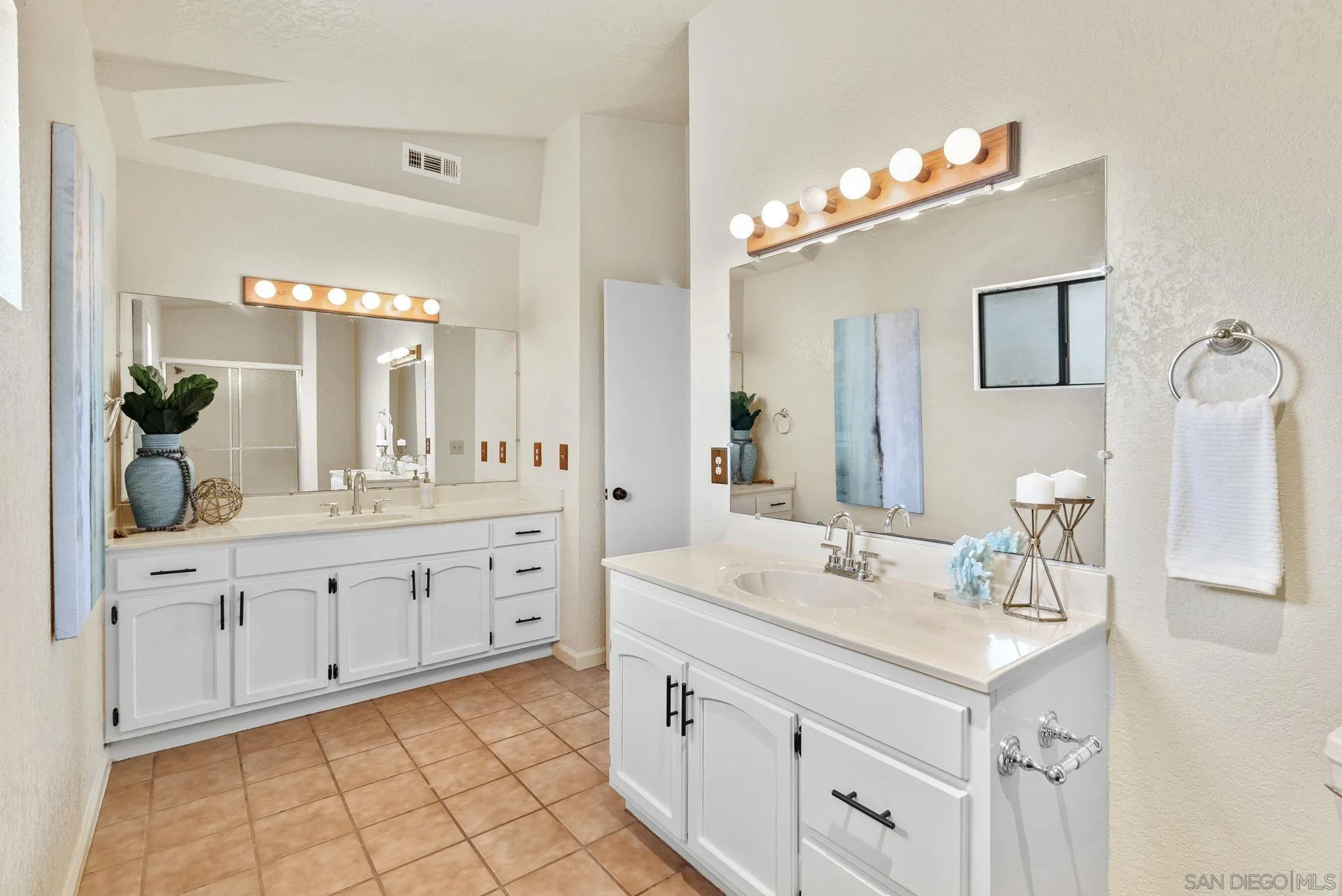 3290 Quail Way Jamul, CA 91935 - Photo 47 of 73 a spacious bathroom with a double vanity sink mirror and