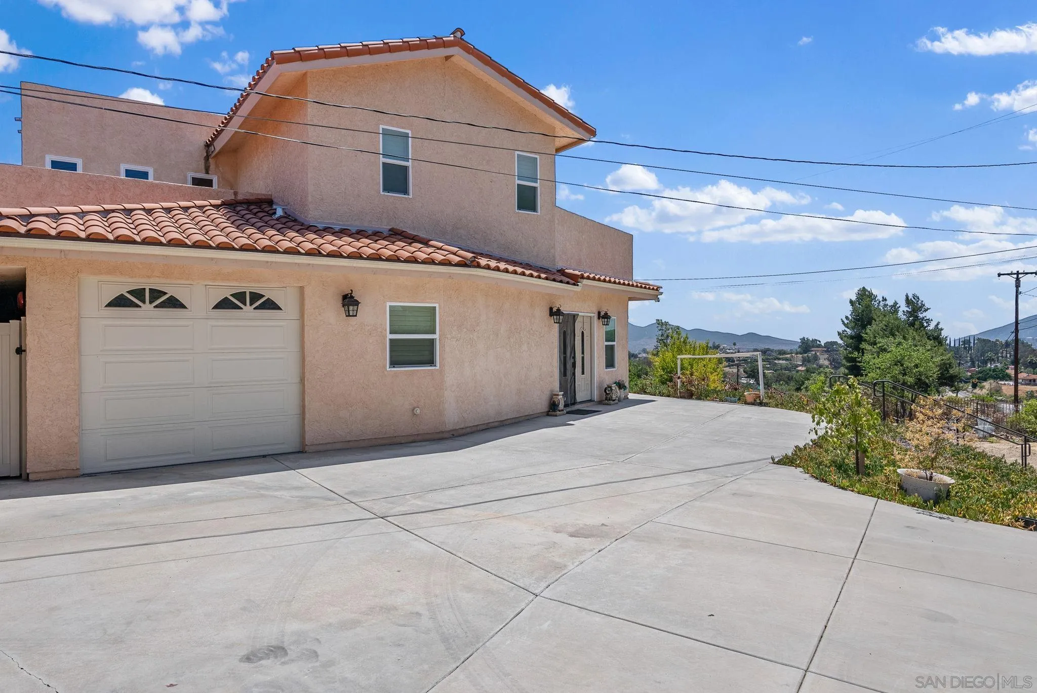 3290 Quail Way Jamul, CA 91935 - Photo 53 of 73 a front view of a house with a garage