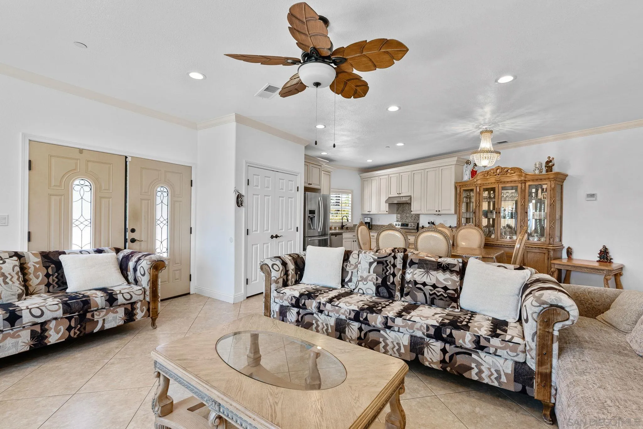3290 Quail Way Jamul, CA 91935 - Photo 58 of 73 a living room with furniture and a chandelier