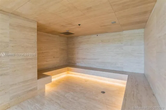 a room with furniture and a wooden floor