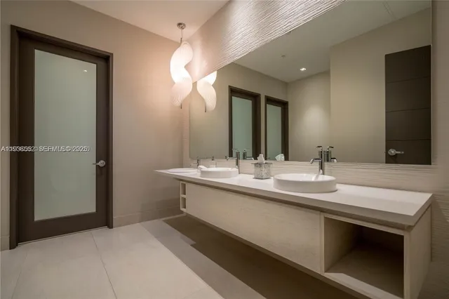 a bedroom with a bed and a cabinets