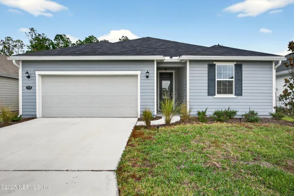 a front view of house with yard