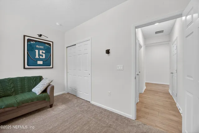 a view of livingroom with furniture and windows