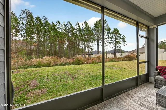 a view of a porch with a back yard