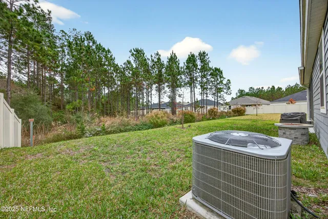 a view of yard with tree s