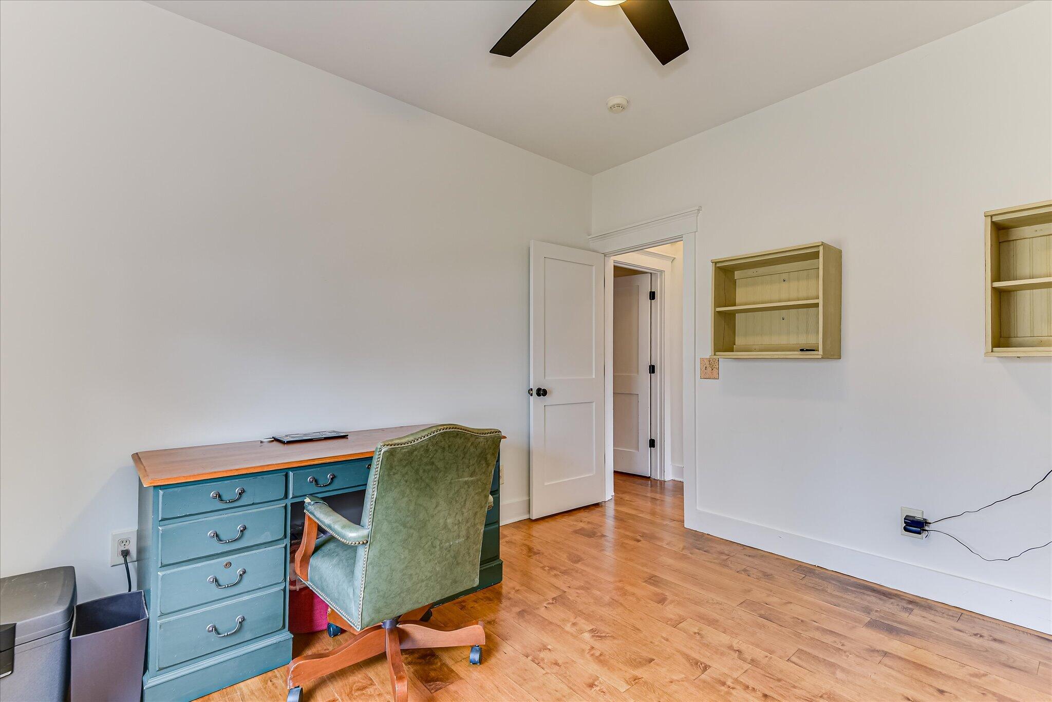 1063 Colbert Bridge Road Aiken, SC 29803 - Photo 15 of 68 wooden floor with an empty room