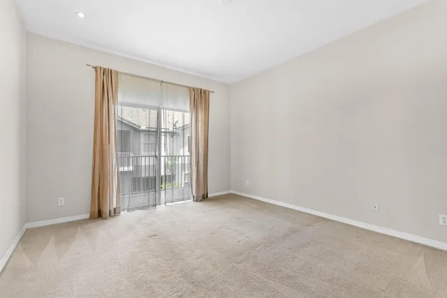 wooden floor and window in an empty room